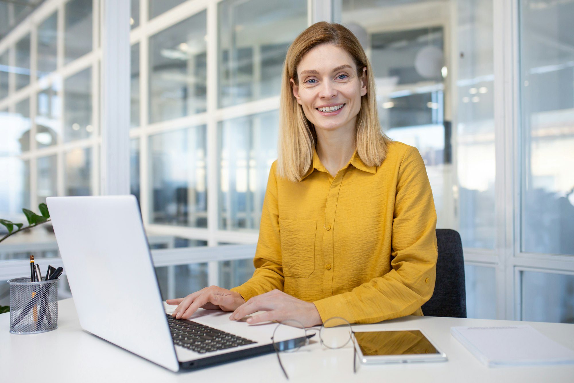 Empowered businesswoman working happily in office